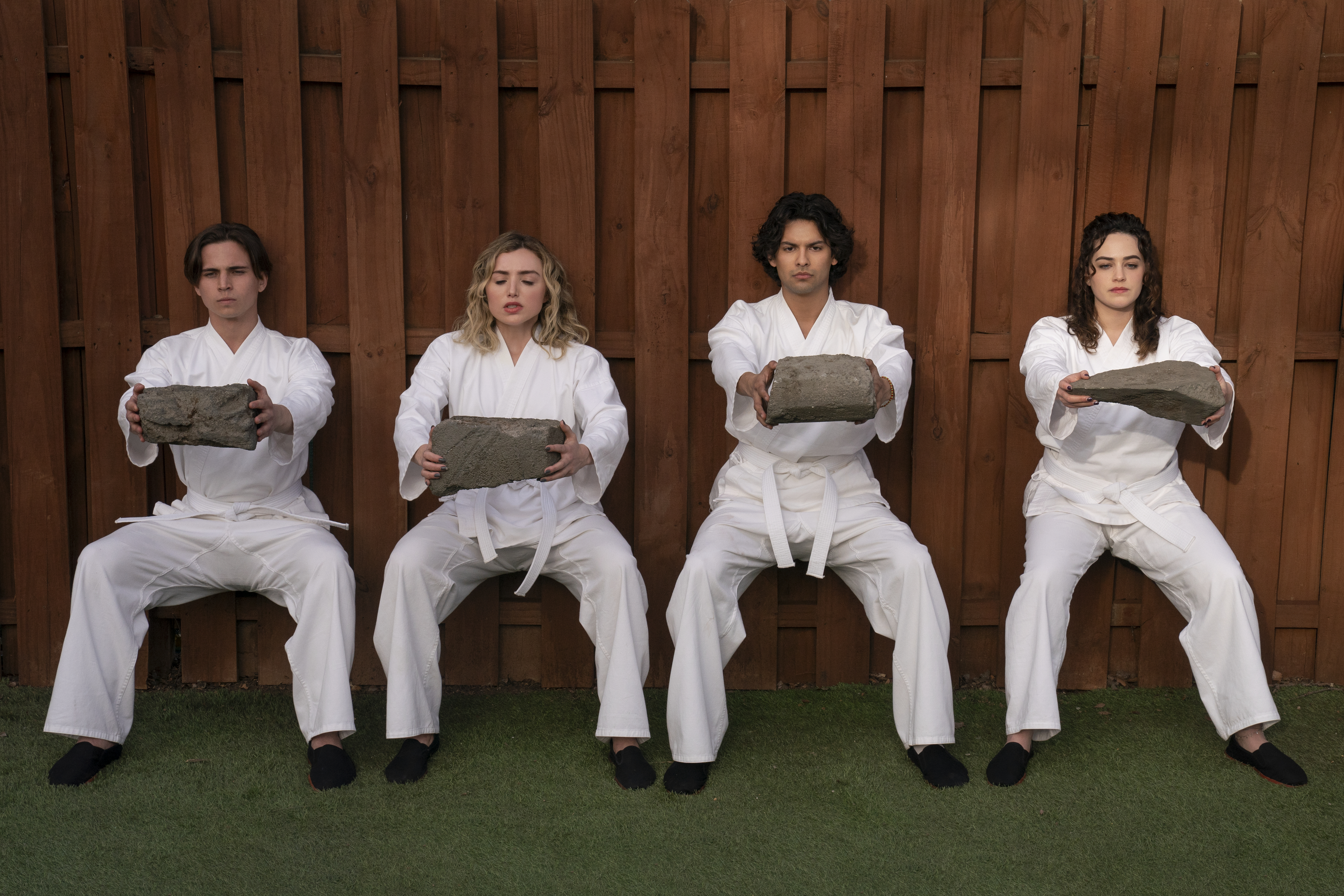 Cobra Kai. (L to R) Tanner Buchanan as Robby Keene, Peyton List as Tory Nichols, Xolo Maridueña as Miguel Diaz, Mary Mouser as Samantha LaRusso in Cobra Kai. Cr. Curtis Bonds Baker/Netflix © 2024