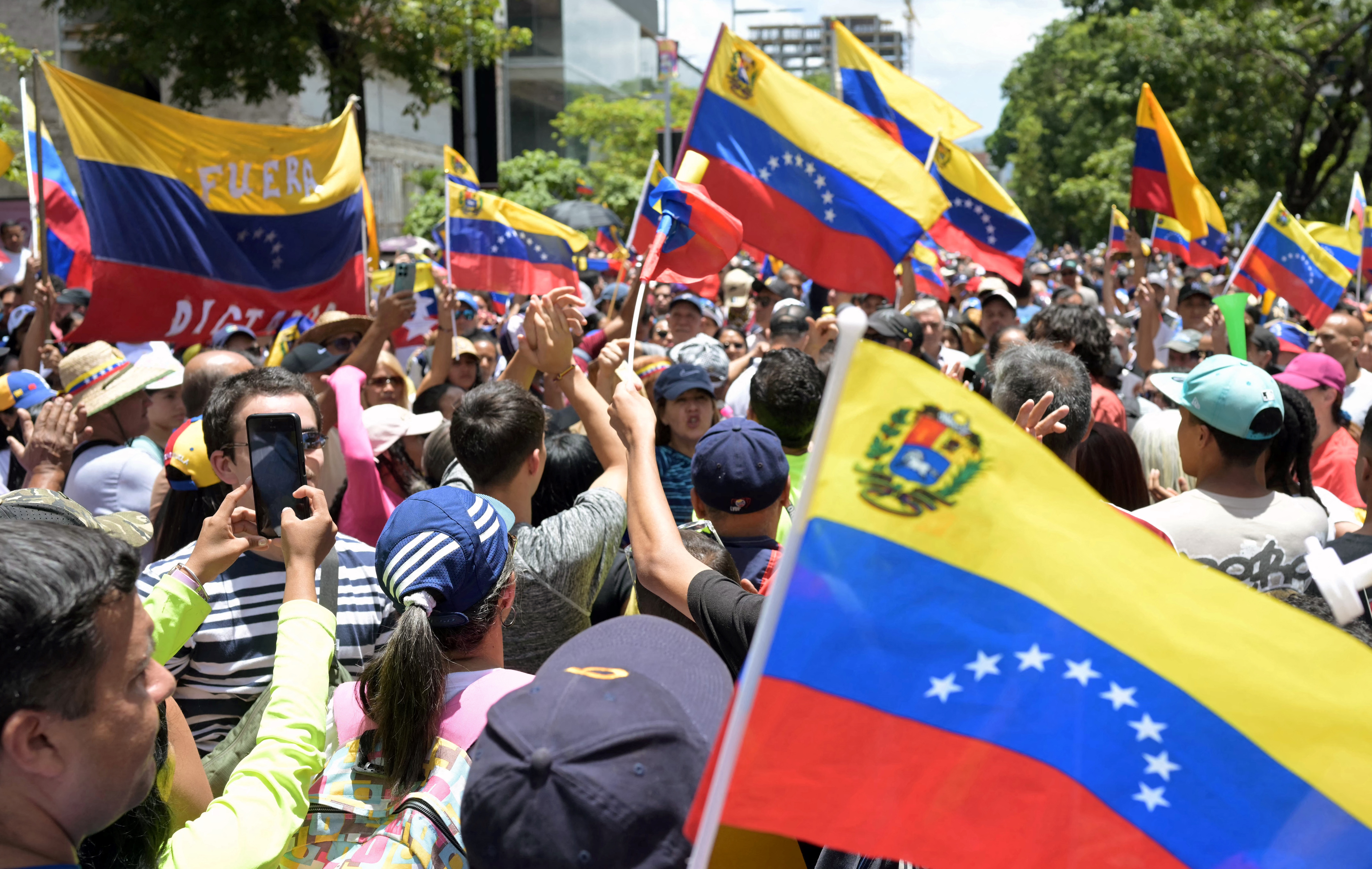 Opponents of Venezuelan President Nicolas Maduro take part in a demonstration called by opposition leader Maria Corina Machado over the presidential election disputed results, in Caracas on August 3, 2024. Venezuela braced for fresh protests after President Nicolas Maduro's disputed election victory was ratified on the eve -- and a growing number of nations recognized his opposition rival as the true winner. (Photo by YURI CORTEZ / AFP) (Photo by YURI CORTEZ/AFP via Getty Images)