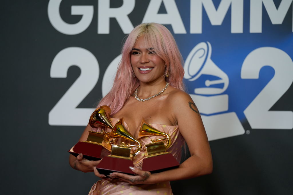 The singer Karol G, poses with the 3 Grammys that have been awarded to her during the Latin Grammy 2023 awards.