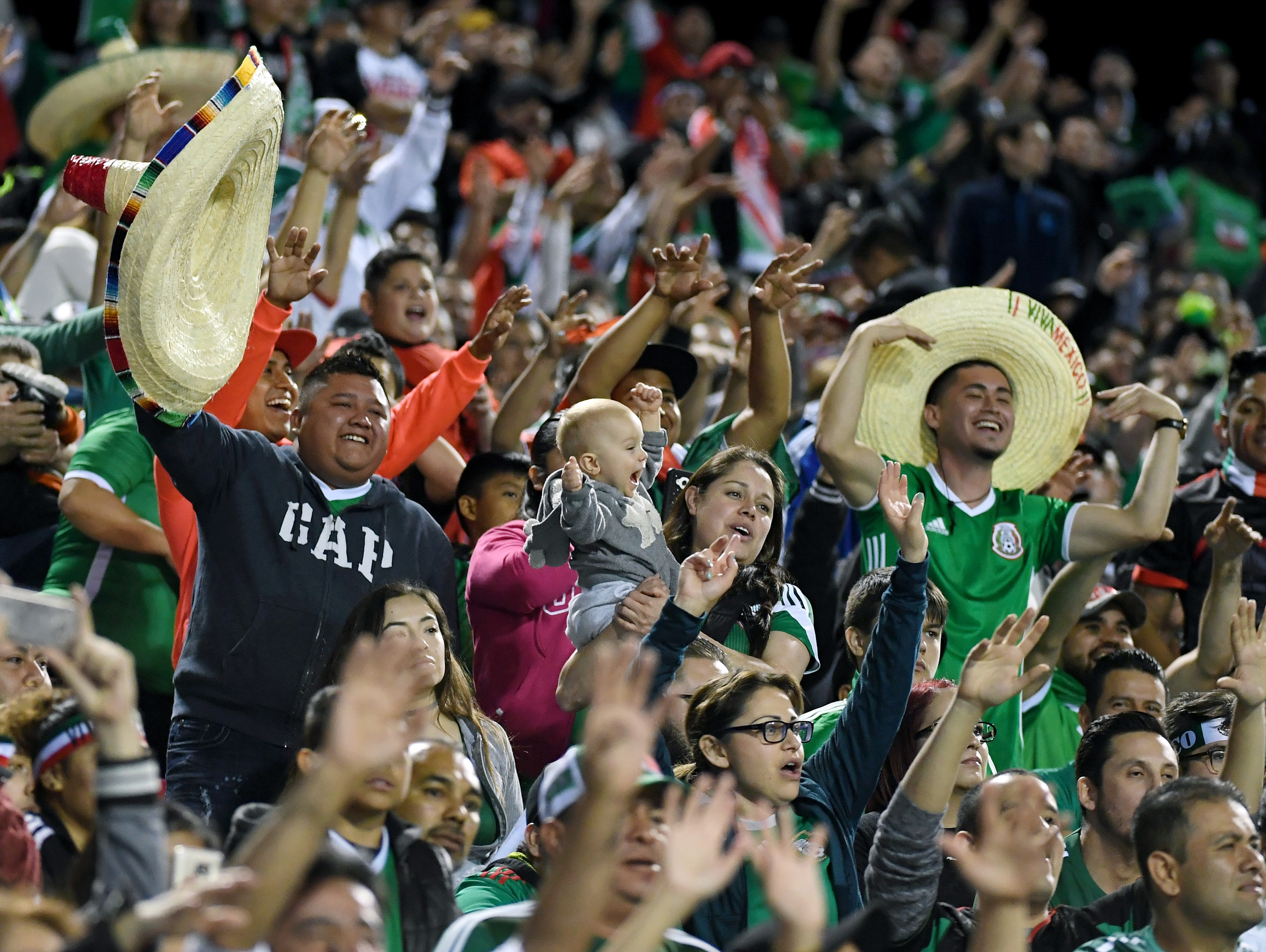 Mexico fans cheer during the team’s exhibition match against Iceland at Sam...