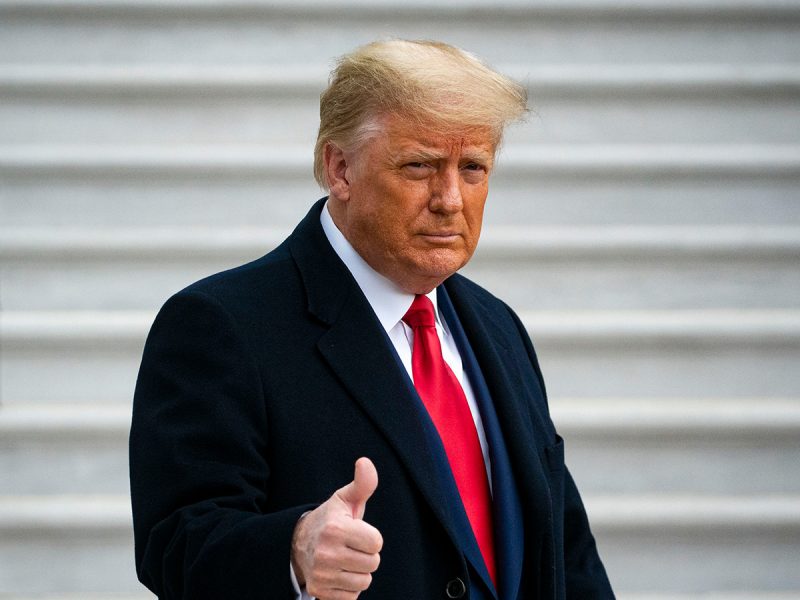 U.S. President Donald Trump gives a thumbs up as he departs on the South Lawn of the White House, on December 12, 2020 in Washington, DC. Photo by Al Drago/Getty Images
