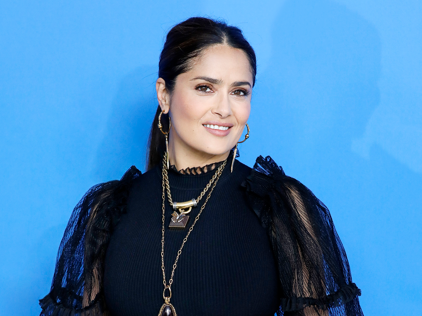 How Salma Hayek's Pet Owl, Her Husband's Company & Role in Gucci Film Are  All Interconnected