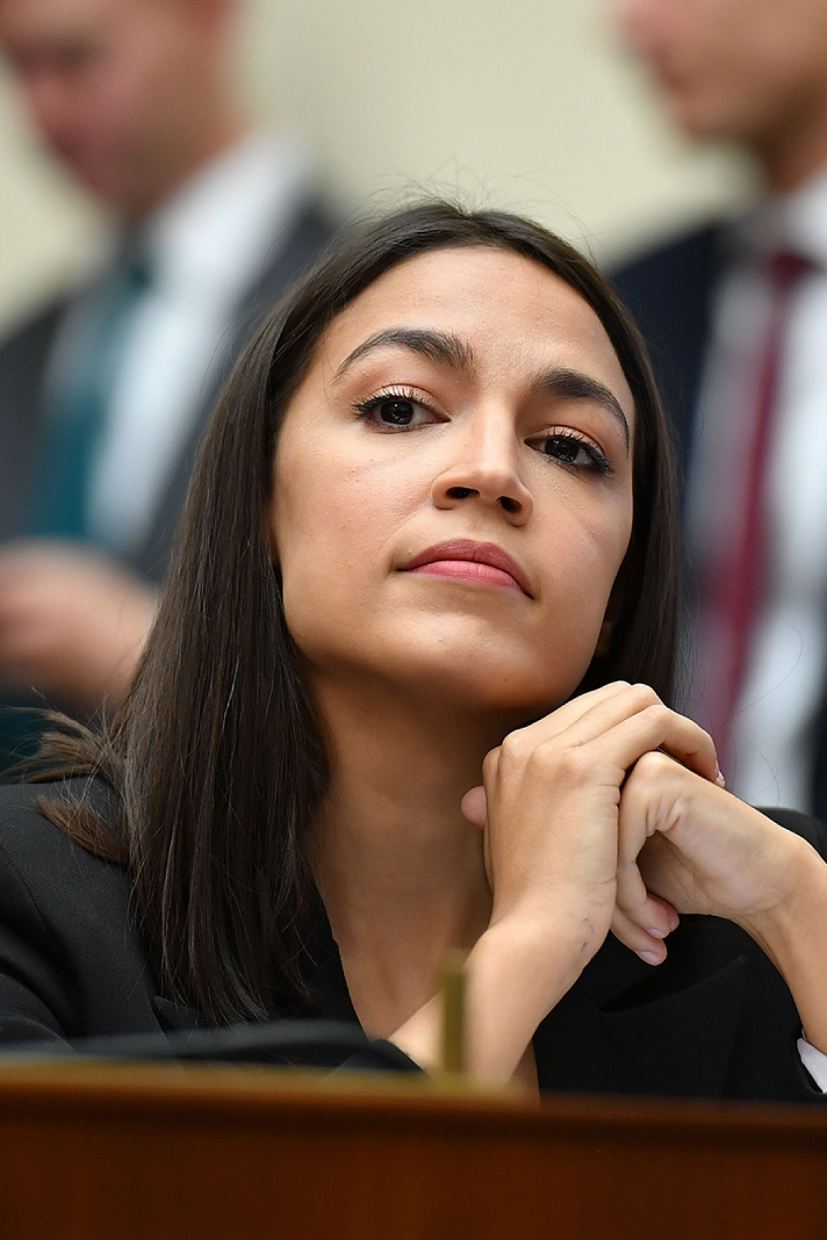 Rep. Alexandria Ocasio-Cortez(AOC) listens as Facebook Chairman and CEO Mark Zuckerberg testifies before the House Financial Services Committee on 