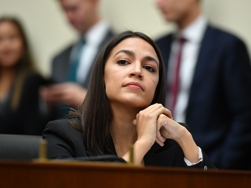 Rep. Alexandria Ocasio-Cortez(AOC) listens as Facebook Chairman and CEO Mark Zuckerberg testifies before the House Financial Services Committee on 