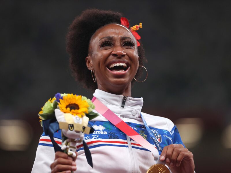 TOKYO, JAPAN - AUGUST 02: Gold medalist, Jasmine Camacho-Quinn of Team Puerto Rico celebrates on the podium during the medal ceremony for the Women’s 100 metres hurdles on day ten of the Tokyo 2020 Olympic Games at Olympic Stadium on August 02, 2021 in Tokyo, Japan.