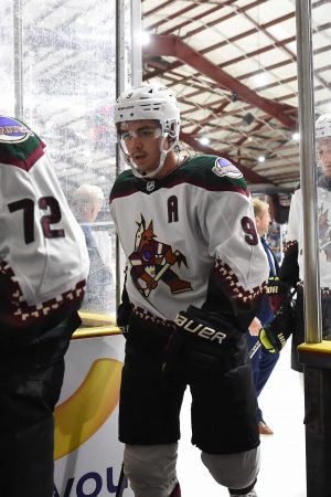 EL PASO, TX - OCTOBER 3: Clayton Keller #9 of the Arizona Coyotes walks to the locker room during the 2020 Kraft Hockeyville game against the Dallas Stars at the El Paso Community Events Center on October 3, 2021 in El Paso, Texas.