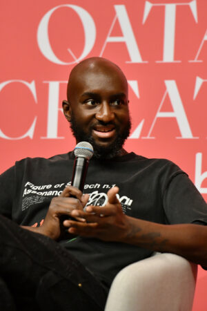 DOHA, QATAR - NOVEMBER 04: Virgil Abloh (pictured), Samir Bantal, Director of AMO, the research and design branch of OMA, and Rosanne Somerson, President Emerita of Rhode Island School of Design and Principal of Somerson Studio, participate in a public talk during #QatarCreates on November 4, 2021 at the National Museum of Qatar in Doha. #QatarCreates is a cultural celebration connecting the fields of art, fashion, and design through a diverse program of exhibitions, awards, public talks, and special events, all taking place in the heart of Doha.