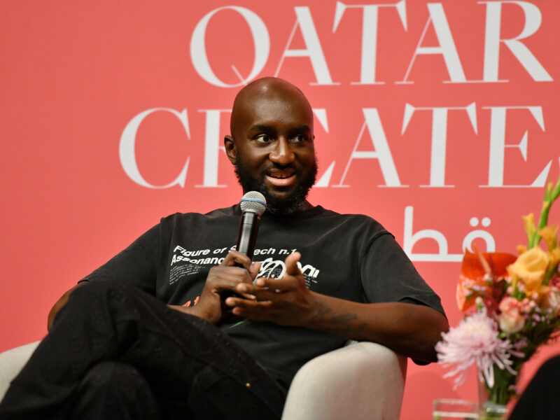 DOHA, QATAR - NOVEMBER 04: Virgil Abloh (pictured), Samir Bantal, Director of AMO, the research and design branch of OMA, and Rosanne Somerson, President Emerita of Rhode Island School of Design and Principal of Somerson Studio, participate in a public talk during #QatarCreates on November 4, 2021 at the National Museum of Qatar in Doha. #QatarCreates is a cultural celebration connecting the fields of art, fashion, and design through a diverse program of exhibitions, awards, public talks, and special events, all taking place in the heart of Doha.