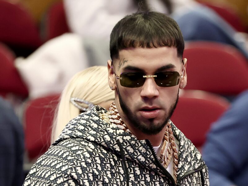 CLEVELAND, OHIO - FEBRUARY 19: Anuel AA is seen during the Taco Bell Skills Challenge as part of the 2022 All-Star Weekend at Rocket Mortgage Fieldhouse on February 19, 2022 in Cleveland, Ohio. NOTE TO USER: User expressly acknowledges and agrees that, by downloading and or using this photograph, User is consenting to the terms and conditions of the Getty Images License Agreement. (Photo by Arturo Holmes/Getty Images)_Blue