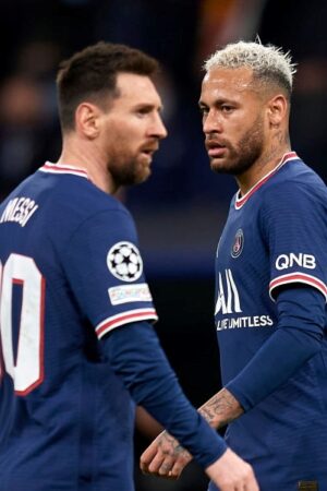 Leo Messi and Neymar of PSG during the UEFA Champions League Round Of Sixteen Leg Two match between Real Madrid and Paris Saint-Germain at Estadio Santiago Bernabeu on March 9, 2022 in Madrid, Spain. (Photo by Jose Breton/Pics Action/NurPhoto via Getty Images)