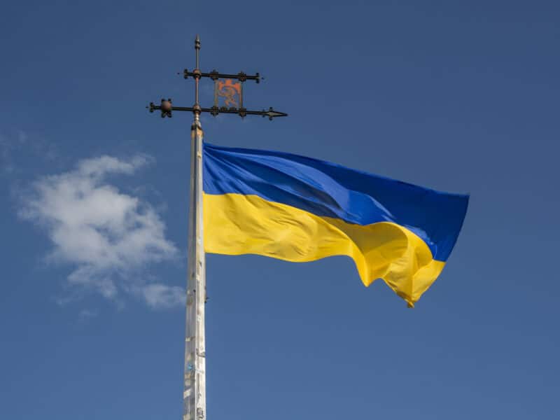 Ukrainian flag with the The coat of arms of the city Lviv,Ukraine for post about Latin American countries speaking in support of Ukraine.