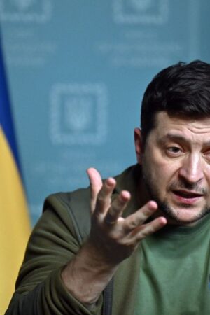Ukrainian President Volodymyr Zelensky speaks during a press conference in Kyiv on March 3, 2022. - Ukraine President Volodymyr Zelensky called on the West on March 3, 2022, to increase military aid to Ukraine, saying Russia would advance on the rest of Europe otherwise. "If you do not have the power to close the skies, then give me planes!" Zelensky said at a press conference. "If we are no more then, God forbid, Latvia, Lithuania, Estonia will be next," he said, adding: "Believe me." (Photo by Sergei SUPINSKY / AFP) (Photo by SERGEI SUPINSKY/AFP via Getty Images)