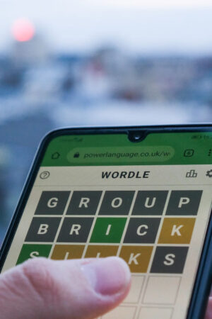 Wordle game displayed on a phone screen is seen in this illustration photo taken in Krakow, Poland on February 6, 2022. (Photo illustration by Jakub Porzycki/NurPhoto via Getty Images)