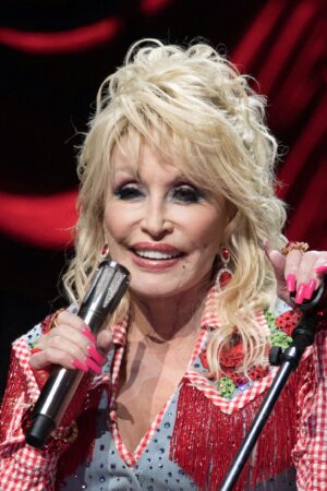 AUSTIN, TEXAS - MARCH 18: Singer-songwriter Dolly Parton performs onstage at "Dollyverse Powered By Blockchain Creative Labs on Eluv.io" during the 2022 SXSW Conference And Festival at ACL Live at The Moody Theater on March 18, 2022 in Austin, Texas. (Photo by Rick Kern/FilmMagic)