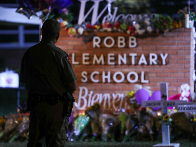 UVALDE,TEXAS, USA - MAY 25:Flowers are placed on a make shift memorial outside Robb Elementary School in Uvalde, Texas, on May 25, 2022. Texas state troopers outside Robb Elementary School 19 students and one teacher were killed during a massacre in a Texas elementary school, the deadliest US school shooting. (Photo by Yasin Ozturk/Anadolu Agency via Getty Images)