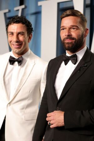 BEVERLY HILLS, CALIFORNIA - MARCH 27: (L-R) Jwan Yosef and Ricky Martin attend the 2022 Vanity Fair Oscar Party hosted by Radhika Jones at Wallis Annenberg Center for the Performing Arts on March 27, 2022 in Beverly Hills, California. (Photo by Rich Fury/VF22/Getty Images for Vanity Fair)