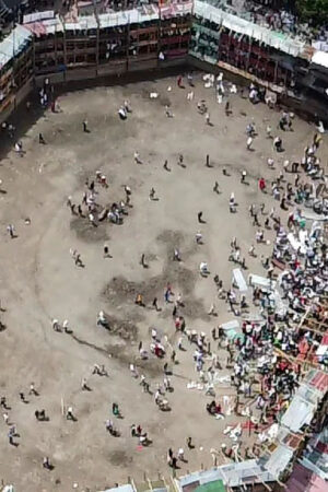 Aerial view of the collapsed grandstand in a bullring in the Colombian municipality of El Espinal, southwest of Bogotá, on June 26, 2022. - At least four people were killed and another 30 seriously injured when a full three-story section of wooden stands filled with spectators collapsed, throwing dozens of people to the ground, during a popular event at which members of the public face off with small bulls, officials said. (Photo by SAMUEL ANTONIO GALINDO CAMPOS / AFP) (Photo by SAMUEL ANTONIO GALINDO CAMPOS/AFP via Getty Images)