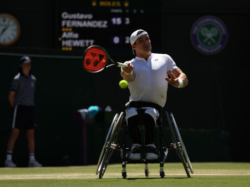 LONDON, ENGLAND - JULY 08: Gustavo Fernandez of Argentina plays a forehand against Alfie Hewett of Great Britain during their Wheelchair Singles Semi Final match on day twelve of The Championships Wimbledon 2022 at All England Lawn Tennis and Croquet Club on July 08, 2022 in London, England. (Photo by Julian Finney/Getty Images)