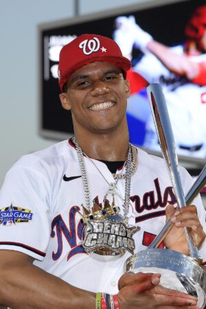 LOS ANGELES, CALIFORNIA - JULY 18: National League All-Star Juan Soto #22 of the Washington Nationals poses with the 2022 T-Mobile Home Run Derby trophy after winning the event at Dodger Stadium on July 18, 2022 in Los Angeles, California. (Photo by Kevork Djansezian/Getty Images)