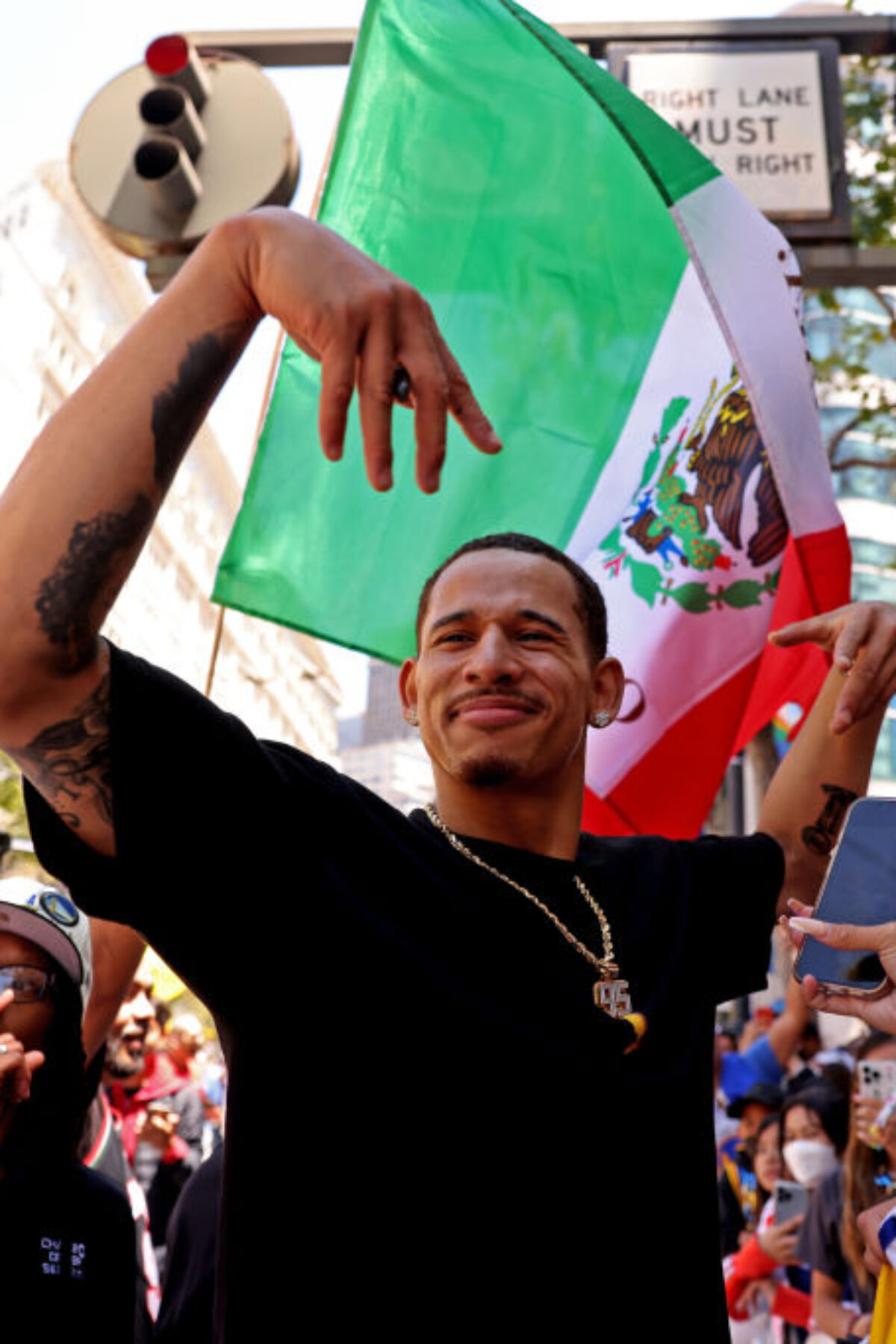 Power forward Juan Toscano Anderson greets fans during the 2022 NBA Champion Golden State Warriors Parade on Monday, June 20, 2022, in San Francisco, Calif. This is the WarriorsÕ fourth NBA Championship in eight years.