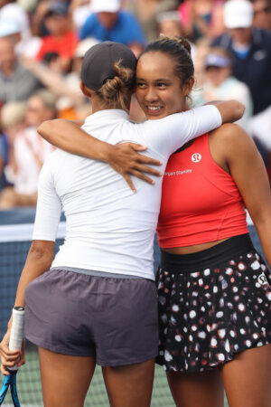 TORONTO, ON - AUGUST 9 - Leylah Fernandez, right, celebrates with her sister Bianca Fernandez as they defeat Kristen Flipkens and Sara Sorribes Tormo in doubles on Court 1 at the National Bank Open presented by Rogers at Sobey's Stadium at York University in Toronto. August 9, 2022. (Steve Russell/Toronto Star via Getty Images)