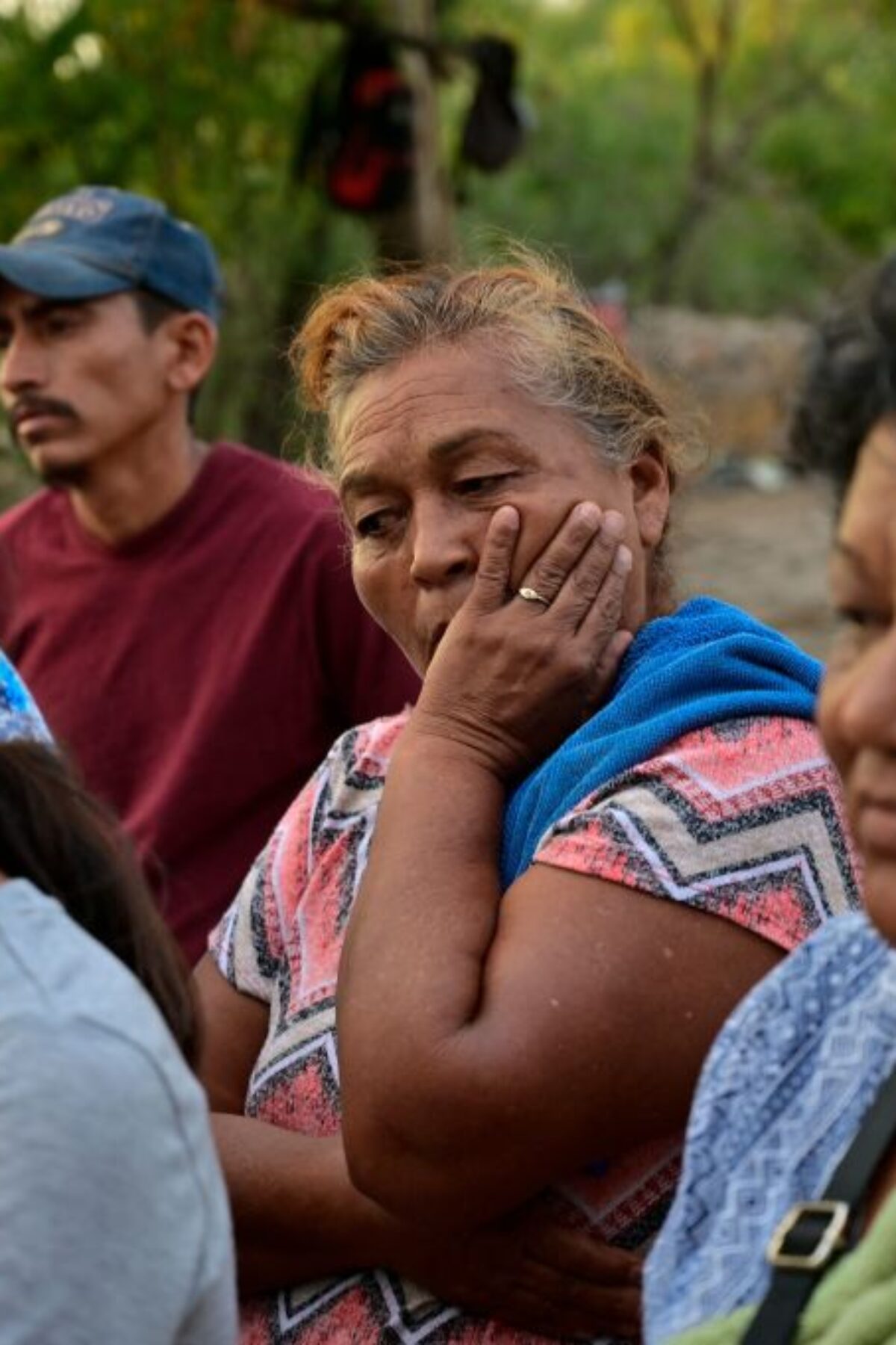 Relatives of the 10 miners trapped in a coal mine after a collapse more than a week, attend a press conference in the community of Agujita, Sabinas Municipality, Coahuila State, Mexico, on August 14, 2022. - The flooded mine where ten workers have been trapped for 11 days in northern Mexico registered an 