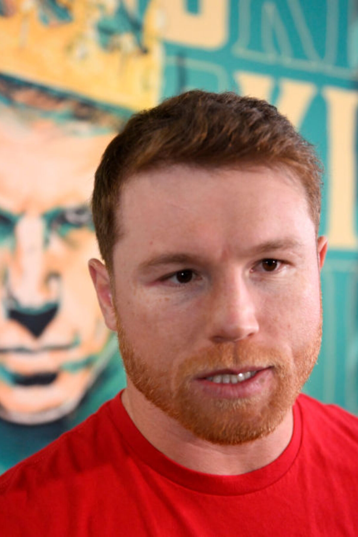 SAN DIEGO, CA - AUGUST 29: Canelo Alvarez does interviews before a media workout at the House of Boxing August 29, 2022 in San Diego, California. (Photo by Denis Poroy/Getty Images)