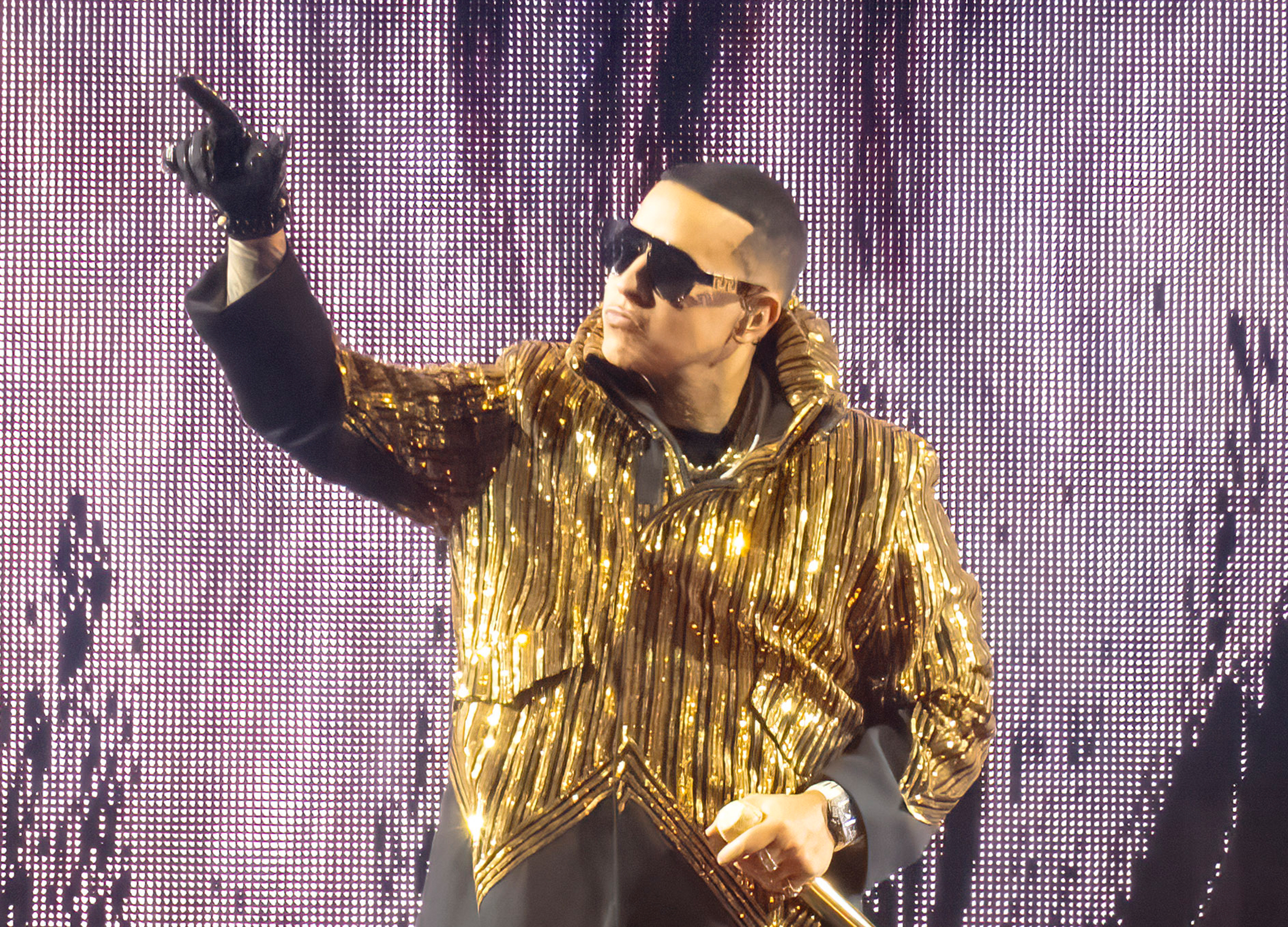 Daddy Yankee poses for a photo before a Champions Cup soccer match