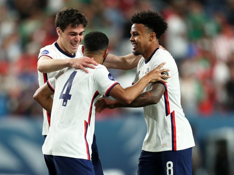 DENVER, CO - JUNE 06: Giovanni Reyna #7, Tyler Adams #4 and Weston McKennie #8 of United States celebrates after winning the CONCACAF Nations League Championship Final between United States and Mexico at Empower Field At Mile High on June 6, 2021 in Denver, Colorado. (Photo by Omar Vega/Getty Images)