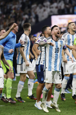 LUSAIL CITY, QATAR - DECEMBER 18: Lionel Messi of Argentina and team celebrate after winning the FIFA World Cup Qatar 2022 Final match between Argentina and France at Lusail Stadium on December 18, 2022 in Lusail City, Qatar. (Photo by Richard Sellers/Getty Images)