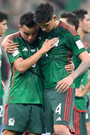TOPSHOT - Mexico's midfielder #08 Carlos Rodriguez (L) and Mexico's midfielder #04 Edson Alvarez (R) react after the Qatar 2022 World Cup Group C football match between Saudi Arabia and Mexico at the Lusail Stadium in Lusail, north of Doha on November 30, 2022. (Photo by Alfredo ESTRELLA / AFP) (Photo by ALFREDO ESTRELLA/AFP via Getty Images)