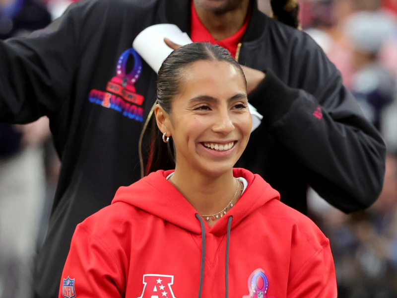 LAS VEGAS, NEVADA - FEBRUARY 05: AFC offensive coordinator Diana Flores and AFC captain Snoop Dogg are introduced during the 2023 NFL Pro Bowl Games at Allegiant Stadium on February 05, 2023 in Las Vegas, Nevada. (Photo by Ethan Miller/Getty Images)