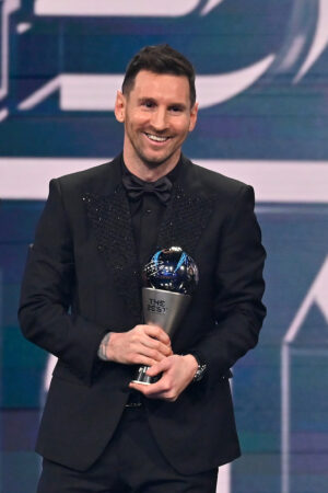 PARIS, FRANCE - FEBRUARY 27: Lionel Messi poses with the Best FIFA Men's Payer 2022 award during The Best FIFA Football Awards 2022 on February 27, 2023 in Paris, France. (Photo by Aurelien Meunier/Getty Images)
