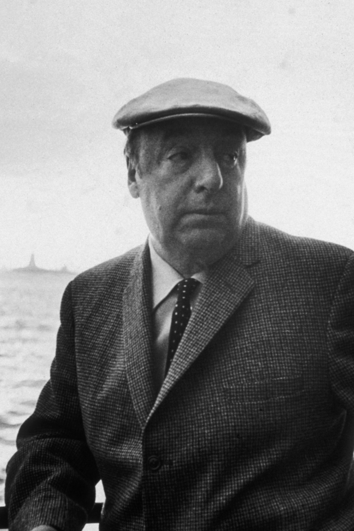 13th June 1966: EXCLUSIVE Chilean poet and activist Pablo Neruda (1904 - 1973) leans on a ship's railing during the 34th annual PEN boat ride around New York City. He wears a cap. (Photo by Sam Falk/New York Times Co./Getty Images)