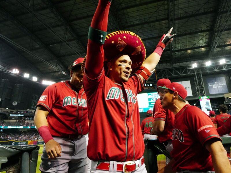 PHOENIX, AZ - MARCH 12: Joey Meneses #32 of Team Mexico is greeted in the dugout after hitting a two-un home run in the first inning during Game 4 of Pool C between Team Mexico and Team USA at Chase Field on Sunday, March 12, 2023 in Phoenix, Arizona. (Photo by Daniel Shirey/WBCI/MLB Photos via Getty Images)