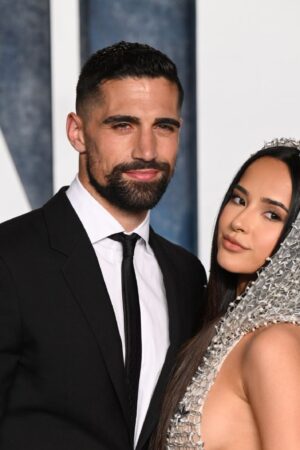 BEVERLY HILLS, CALIFORNIA - MARCH 12: (L-R) Sebastian Lletget and Becky G attend the 2023 Vanity Fair Oscar Party hosted by Radhika Jones at Wallis Annenberg Center for the Performing Arts on March 12, 2023 in Beverly Hills, California. (Photo by Karwai Tang/WireImage)