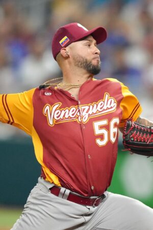 MIAMI, FLORIDA - MARCH 12: Silvino Bracho #56 of Venezuela throws a pitch during the ninth inning against Puerto Rico at loanDepot park on March 12, 2023 in Miami, Florida during the 2023 World Baseball Classic . (Photo by Eric Espada/Getty Images)