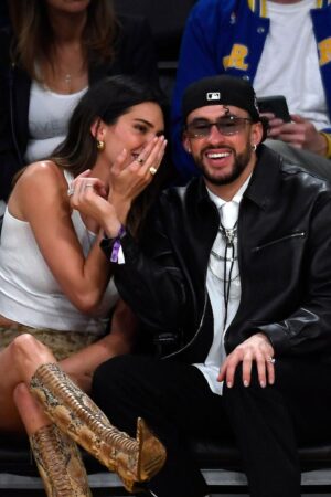 LOS ANGELES, CALIFORNIA - MAY 12: Yung Taco, Renell Medrano, Kendall Jenner and Bad Bunny attend the Western Conference Semifinal Playoff game between the Los Angeles Lakers and Golden State Warriors at Crypto.com Arena on May 12, 2023 in Los Angeles, California. (Photo by Kevork Djansezian/Getty Images)