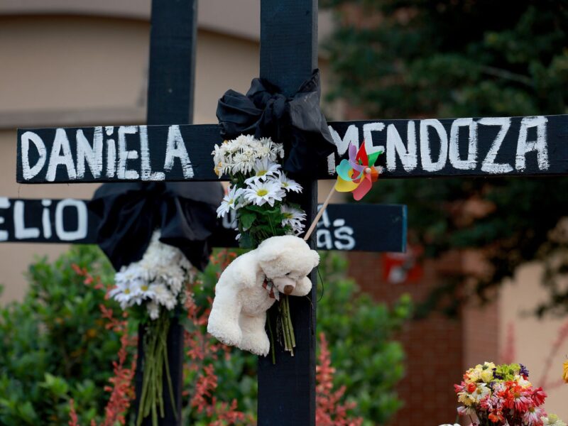 ALLEN, TEXAS - MAY 09: The names of victims are written on crosses setup in a memorial near the scene of a mass shooting at the Allen Premium Outlets mall on May 9, 2023 in Allen, Texas. Eight people were killed and seven wounded in the Saturday attack in which the gunman was killed by police, according to published reports. Three of the wounded are in critical condition, according to the reports. (Photo by Joe Raedle/Getty Images)