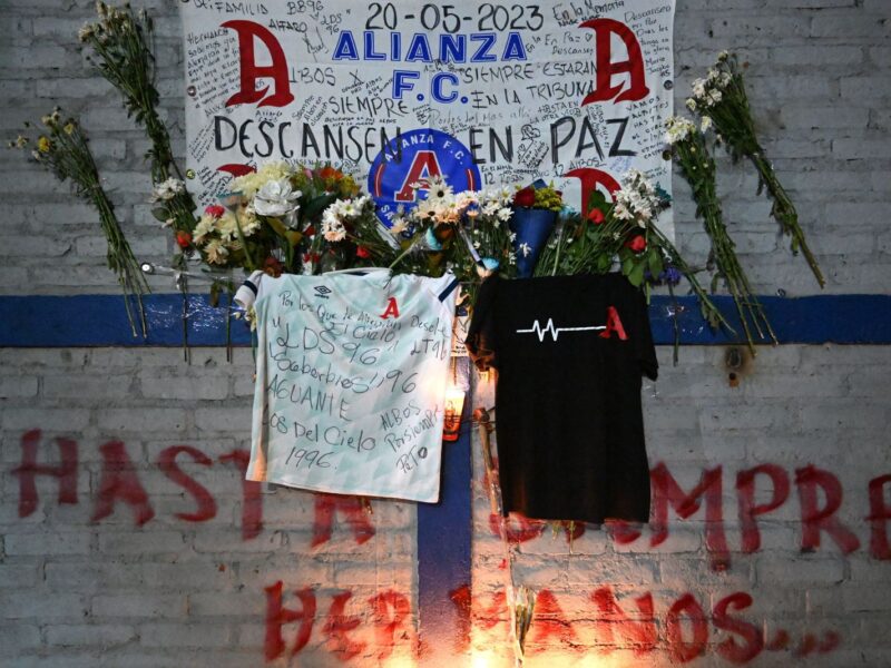 TOPSHOT - A makeshift memorial for victims of a stampede is pictured outside Cuscatlan stadium in San Salvador on May 21, 2023. El Salvador was in shock on May 21, 2023 after 12 people died and hundreds were injured in a stampede at a soccer stadium, as the country's president vowed an investigation. (Photo by MARVIN RECINOS / AFP) (Photo by MARVIN RECINOS/AFP via Getty Images)