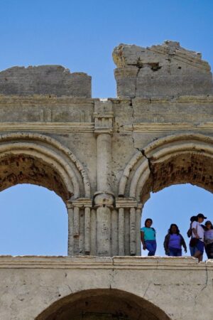 People visit the Temple of Quechula church that emerged from the Malpaso Dam due to a drought that dried up the Grijalba River in Nuevo Quechula, Chiapas, on June 16, 2023. The 16th-century Dominican church has been uncovered by the drought and high temperatures that plague the country. The construction had been almost completely submerged when the dam was built in the area in the 1960s on a tributary of the Grijalva River. Since then, tourists have been arriving by boat to visit it. However, the low level of the dam due to high temperatures, which left eight people dead in Mexico in the last week, meant that the construction was completely exposed, and now visitors arrive at its gates in their cars and motorcycles. (Photo by Raul VERA / AFP) (Photo by RAUL VERA/AFP via Getty Images)