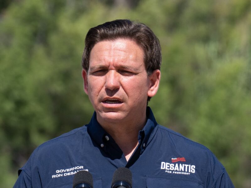 Florida Governor and 2024 Republican Presidential hopeful Ron DeSantis speaks during a news conference near the Rio Grande River in Eagle Pass, Texas, on June 26, 2023. DeSantis engaged with voters and residents in border-adjacent communities during a campaign event. (Photo by SUZANNE CORDEIRO / AFP) (Photo by SUZANNE CORDEIRO/AFP via Getty Images)