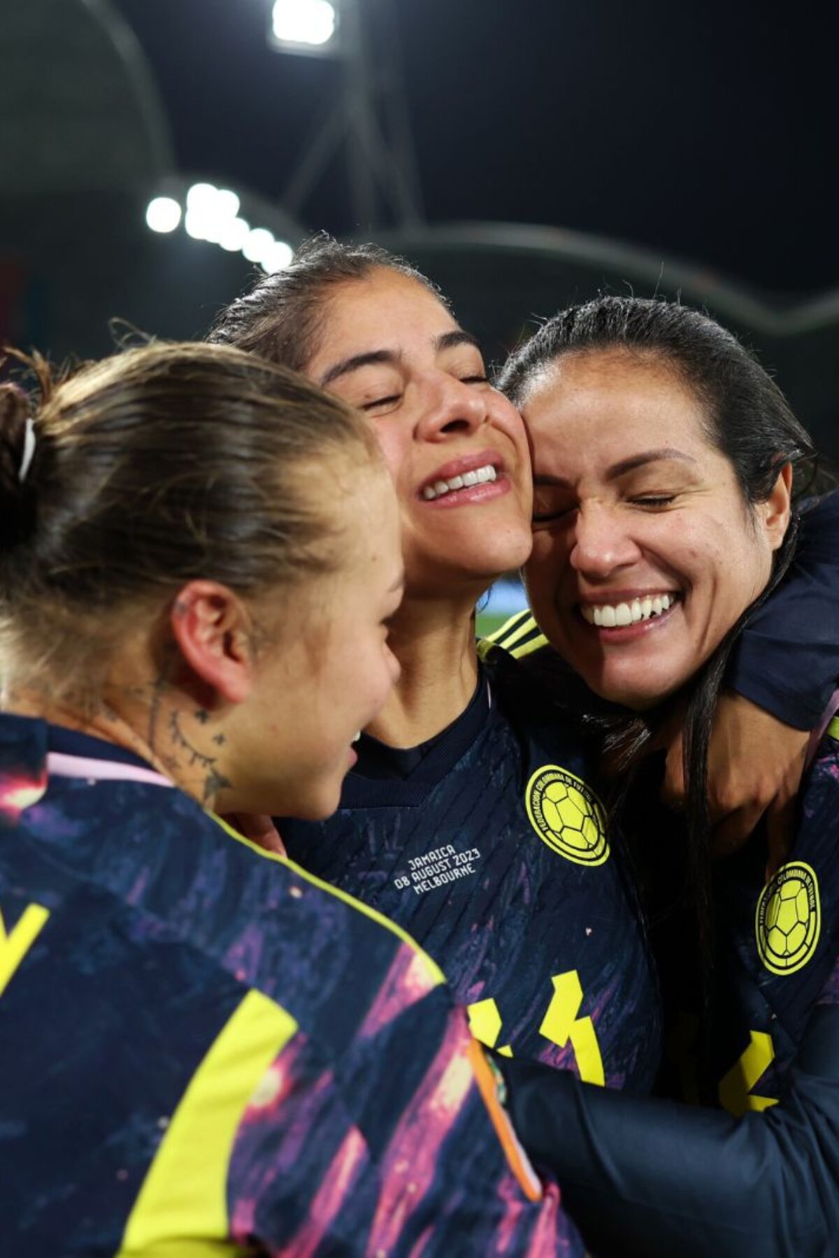 MELBOURNE, AUSTRALIA - AUGUST 08: (L-R) Ana Guzman, Catalina Usme and Diana Ospina Garcia of Colombia celebrate after the team's 1-0 victory and advance to the quarter final following the FIFA Women's World Cup Australia & New Zealand 2023 Round of 16 match between Colombia and Jamaica at Melbourne Rectangular Stadium on August 08, 2023 in Melbourne / Naarm, Australia. (Photo by Alex Pantling - FIFA/FIFA via Getty Images)