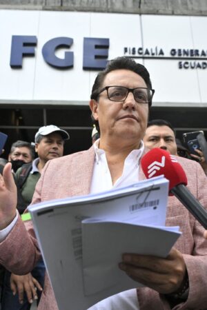 Former Assembly member and now presidential candidate, Fernando Villavicencio, speaks to journalists upon his arrival at the Attorney General's Office in Quito on August 8, 2023. Fernando Villavicencio asked the Attorney General's Office to investigate former officials related to the oil sector of the governments of Rafael Correa, Lenín Moreno, and Guillermo Lasso as part of a criminal complaint that he filed on Tuesday. (Photo by Rodrigo BUENDIA / AFP) (Photo by RODRIGO BUENDIA/AFP via Getty Images)