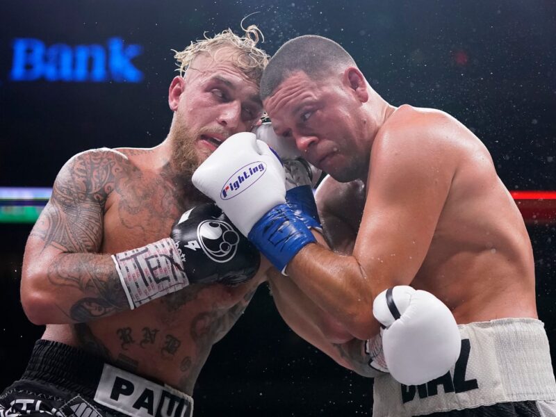 DALLAS, TEXAS - AUGUST 05: Jake Paul, left, and Nate Diaz, right, trade punches during the tenth round of their fight at the American Airlines Center on August 05, 2023 in Dallas, Texas. (Photo by Sam Hodde/Getty Images)