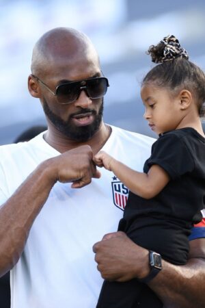 CALIFORNIA , UNITED STATES - 3 August 2019; Retired NBA star Kobe Bryant and daughter Bianka Bella prior to the Women's International Friendly match between USA and Republic of Ireland at Rose Bowl in Pasadena, California, USA. (Photo By Cody Glenn/Sportsfile via Getty Images)
