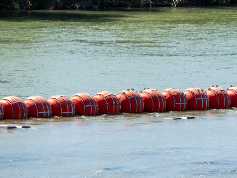 River barrier placed on the water along the Rio Grande border with Mexico in Eagle Pass, Texas, on July 15, 2023, to prevent migrants from entering the US. The buoy installation is part of an operation Texas is pursuing to secure its borders, but activists and some legislators say Governor Greg Abbott is exceeding his authority. (Photo by SUZANNE CORDEIRO / AFP) (Photo by SUZANNE CORDEIRO/AFP via Getty Images)