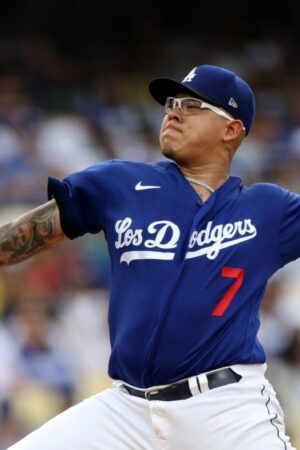 LOS ANGELES, CALIFORNIA - AUGUST 19: Julio Urías #7 of the Los Angeles Dodgers pitches against the Miami Marlins during the second inning at Dodger Stadium on August 19, 2023 in Los Angeles, California. (Photo by Harry How/Getty Images)
