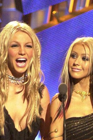 Britney Spears and Christina Aguilera during MTV VMA 2000 Stage at Radio City Music Hall in New York City, New York, United States. (Photo by Jeff Kravitz/FilmMagic, Inc)