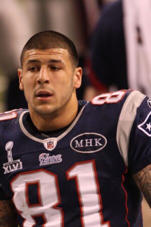 INDIANAPOLIS, IN - FEBRUARY 5: Aaron Hernandez #81 of the New England Patriots stands on the field prior to the game against the New York Giants at Lucas Oil Stadium on February 5, 2012 in Indianapolis, Indiana. The Giants defeated the Patriots 21-17. (Photo by Michael Zagaris/San Francisco 49ers/Getty Images)